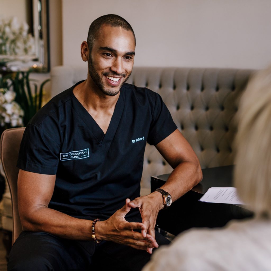 Aesthetic Clinician consulting with a client in Harley Street